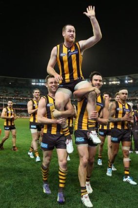 Milestone: Jarryd Roughead is chaired off the ground after his 200th match.