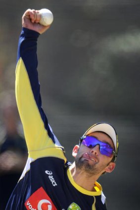 Australian spinner Nathan Lyon sends down a delivery.