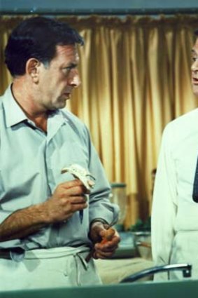 Actors Jack Klugman (L), portraying "Oscar Madison," and Tony Randall, portraying "Felix Unger," in a scene from their 1970's television series "The Odd Couple."