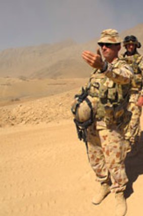 Stuart Yeaman pictured with David Hurley and Major General Michael Hindmarsh, Commander of the Middle East Area of Operations, in Oruzgan Province, Afghanistan.