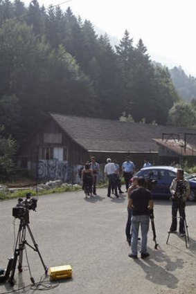 Journalists Journalists near the site of the four murders in the French Alps in September.