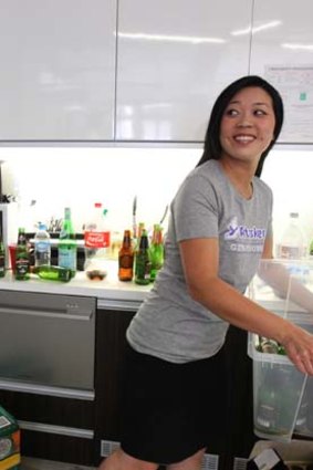 Teresa Hong from Airtasker cleans a kitchen after a party.