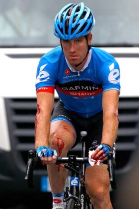 Tyler Farrar of the USA riding for Garmin-Sharp is the last rider to cross the finish line after he was involved in a crash in the last three kilometers of stage five of the 2012 Tour de France from Rouen to Saint-Quentin.