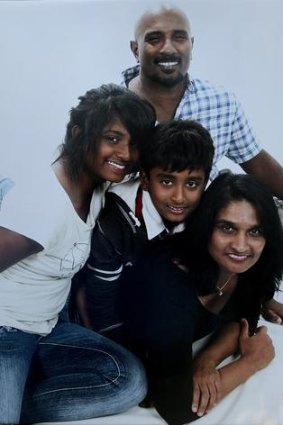 'I would have been killed'' ... Premakumar Gunaratnam with his wife and children in a family photo taken last year.