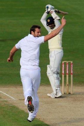 England's Chris Tremlett (L) celebrates the dismissal of Sri Lanka's Prasanna Jayawardene.
