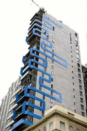 A blue ribbon of steel wraps its way around the 6.7-metre wide tower.