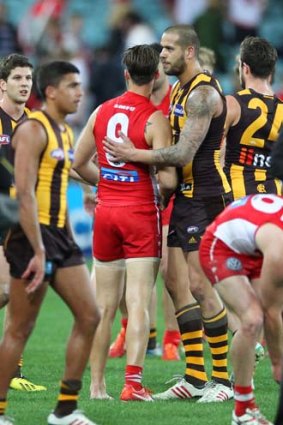 Lance Franklin shakes hands with Nick Malceski after the game.