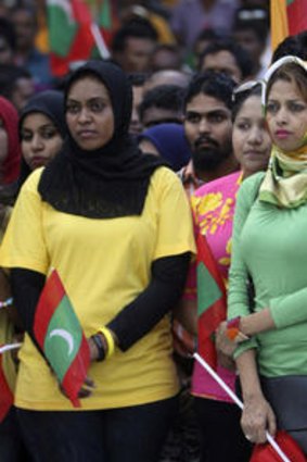 Government supporters rally against religious extremism in Male, Maldives.