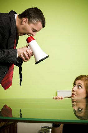 Wrong message: A bullying manager scares an employee into hiding.