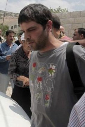 One of the settlers detained in Burin, who was handed over to the Israeli army by Palestinian security forces.