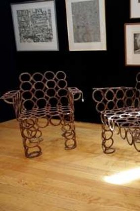 A bench made from horseshoes.