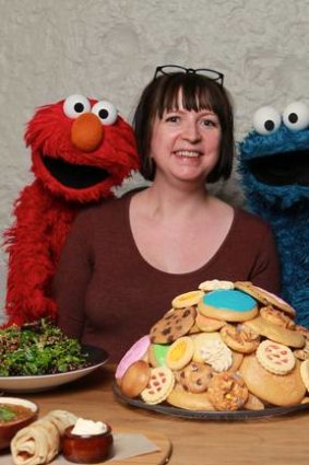 Elmo and Cookie Monster with Kylie Northover.