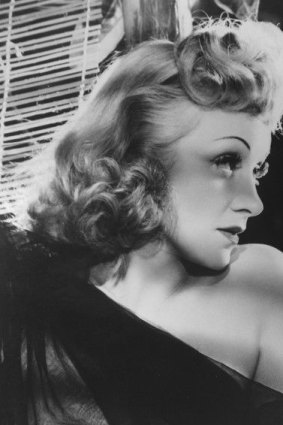 Marlene Dietrich and John Wayne in <I>Seven Sinners</I>.