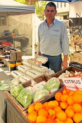 Trading post ... Andrew Hearne sells produce at the organic food market in Double Bay.
