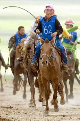 Mongolia's child jockeys get prizes for coming first, second - and last.