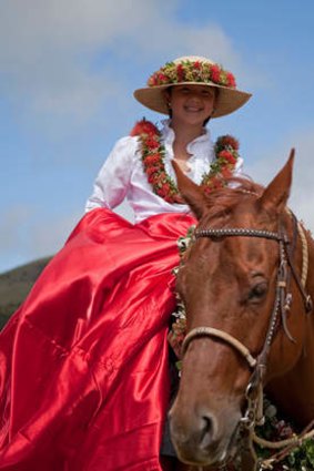A young rider dressed for a festival.