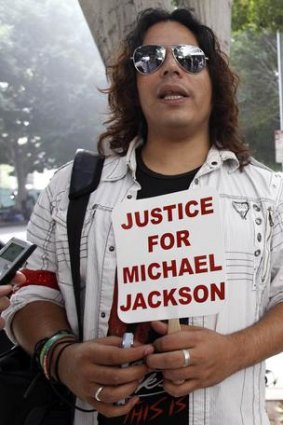 Persuaded ... Jackson fan Gregory Son intends to spend every day protesting against the doctor outside the court.