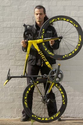 Andrew Oosterweghel with the Cadel Evans replica bike.