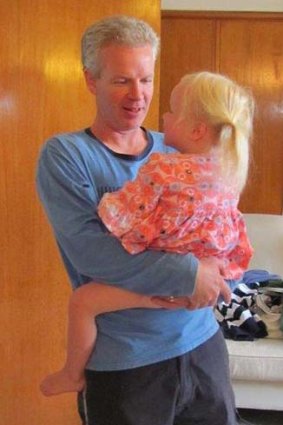 Mr Gilham hugs his daughter.