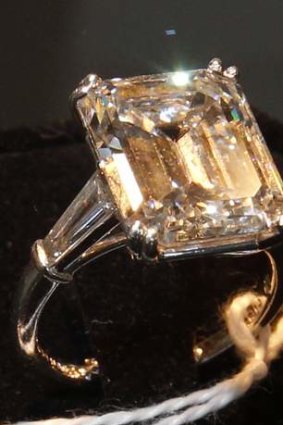 Expensive tastes: A 10-carat diamond ring belonging to Bernard Madoff that was auctioned in New York to help repay his debts.
