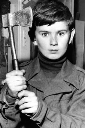 Shane Spiller with his tomahawk. The youngster had been walking along the beach with friend Yvonne Tuohy, 12, when she was snatched and brutally murdered by Derek Percy.