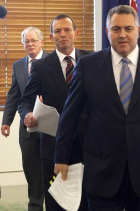 Opposition leader Tony Abbott with his shadow treasurer Joe Hockey and finance spokesman Andrew Robb.