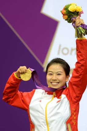 First ... Yi Siling from China celebrates winning gold.