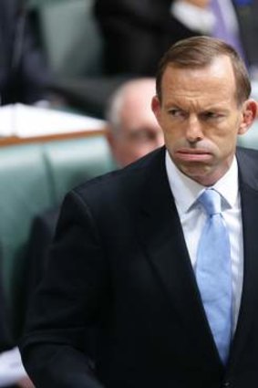 Tony Abbott: Denies the government is backing away from a pre-election commitment.