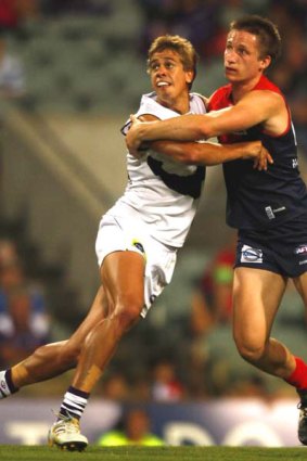 Two young guns: Melbourne's Jack Grimes and Fremantle's Stephen Hill.