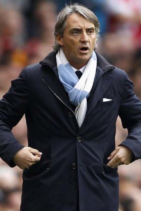 Needs more spirit from his players ... Manchester City's manager Roberto Mancini.