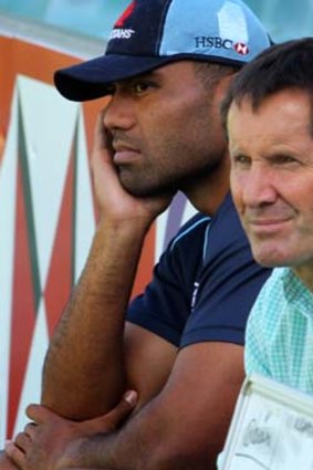 Sitting it out ... Wycliff Palu with Wallabies' coach Robbie Deans.