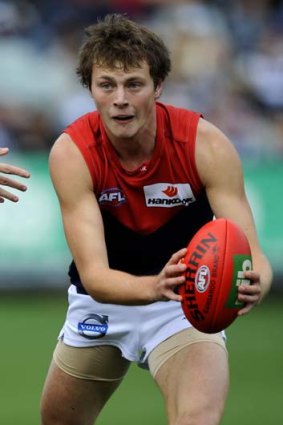 Tough call: Jordan Gysberts in action for Melbourne against Geelong. He won rave reviews early on.