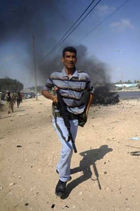 A rebel fighting west of Tripoli.