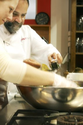 Hands-in ... Greg Malouf teaches Middle-Eastern cuisine at Diana Marsland's Woodend school.