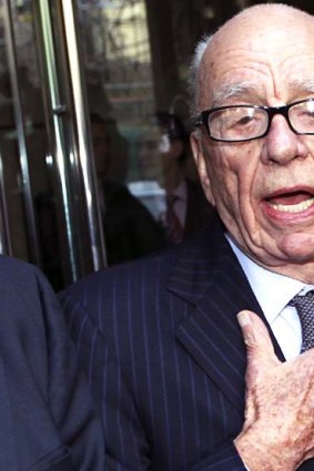 Rupert Murdoch, chairman and chief executive officer of News Corp, speaks to the media in London.