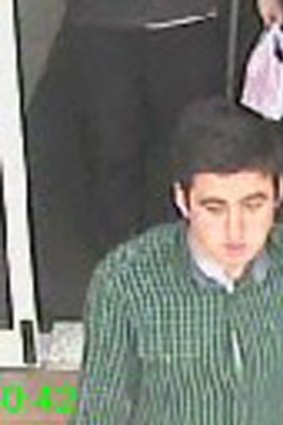 Police wish to speak to this man in relation to the robbery of an elderly woman.