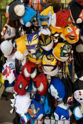 Mexican wrestling masks at a souvenir store in Mercado Plaza.