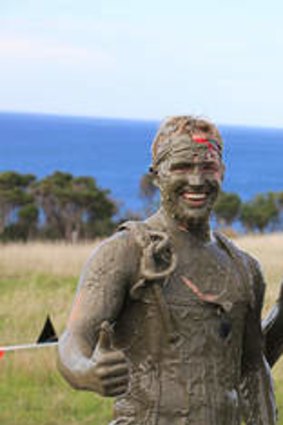 Tough Mudder participants get down and dirty.