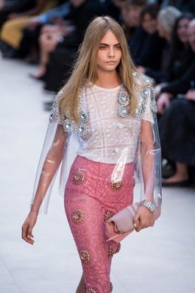 Cara Delevingne on the runway for Burberry Prorsum.