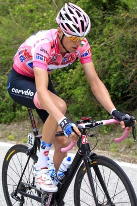 Canadian cyclist Ryder Hesjedal wears the race leader's pink jersey during the eighth stage of the Giro d'Italia in Lago Laceno.
