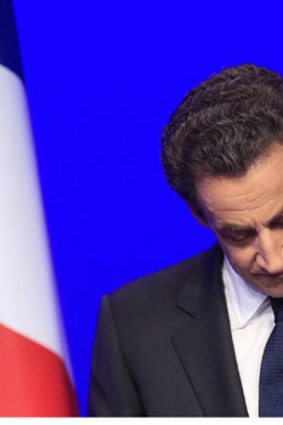 Nicolas Sarkozy faces his loss.