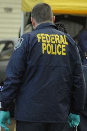 Under investigation ... more than 20 overseas-based officers from the Australian Federal Police.