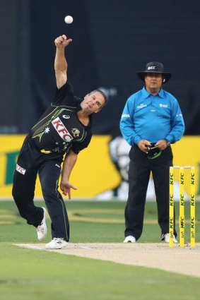 Opening bowler: Playing his first game for Australia in six years, Brad Hodge didn't get to bat, but did bowl the first over of the English innings.