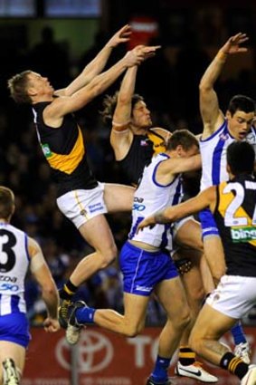 Flight time: Richmond's Jack Riewoldt flies with the pack for a mark.