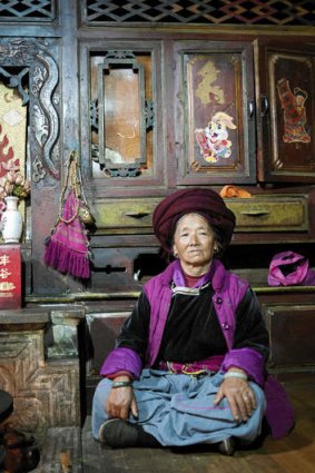 Meet the old boss … a Mosuo minority matriarch, Si Geng Ma, 69, heads a household of 11.
