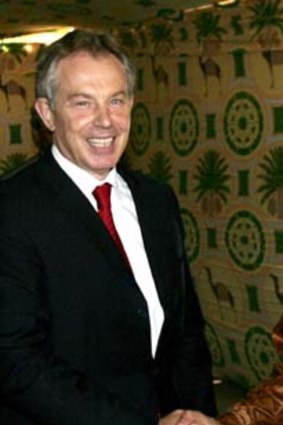 Tony Blair with Muammar Gaddafi.