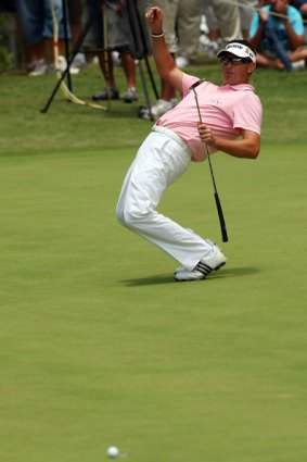 Robert Allenby urges his putt towards the hole on the final day of the Australian PGA.
