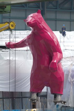 The eight-tonne, bright magenta polar bear and Royal Caribbean?s newest megaship, Quantum of the Seas newest mascot.
