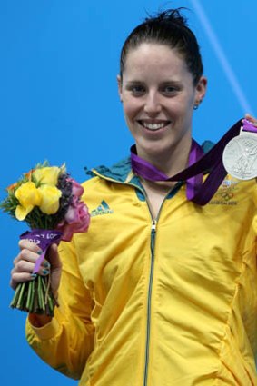Alicia Coutts shows off one of her silver medals.