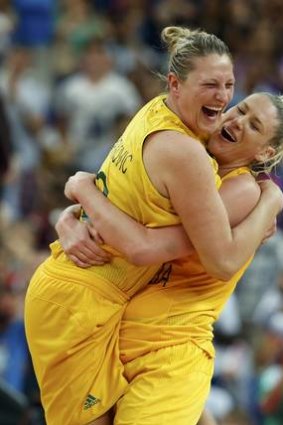 Lauren Jackson, right, celebrates with teammate Suzy Batkovic after the Opals claimed the women's basketball bronze medal.